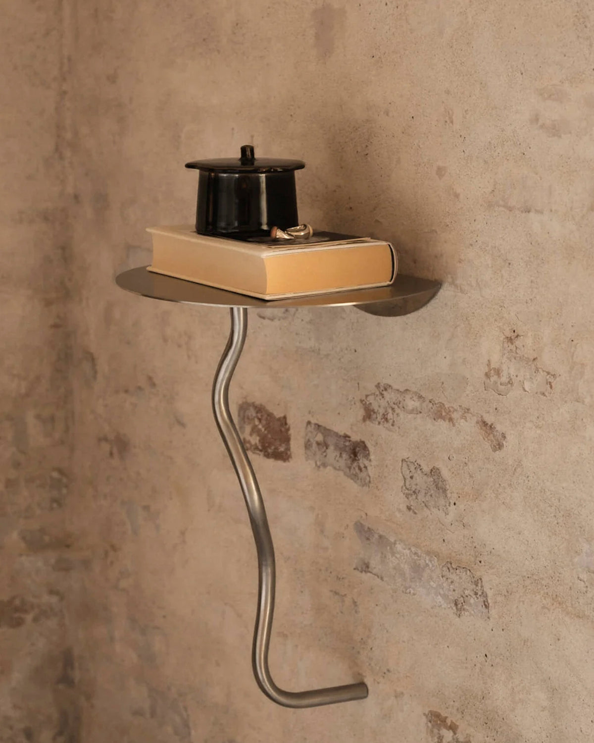 Curvature Wall Table Stainless Steel