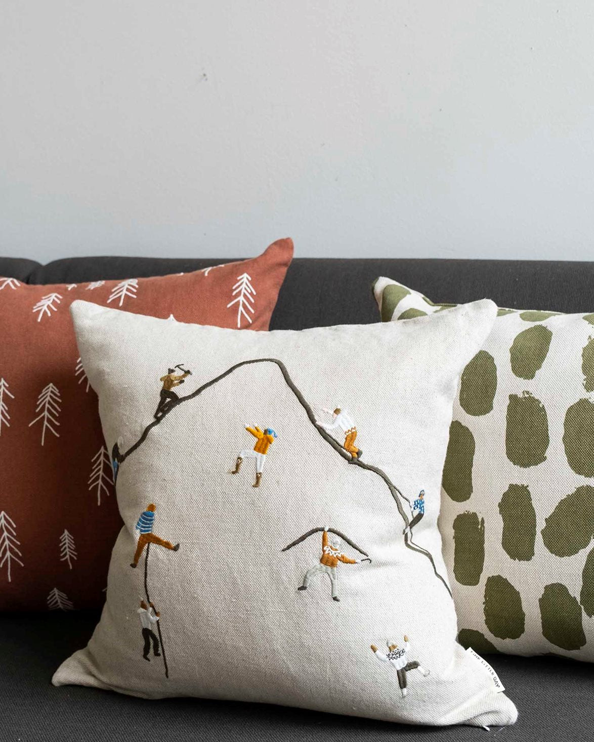 Mountain Climbers Embroidered Cushion Cover
